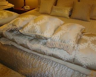 Queen size bedding:  comforter, shams and three decorative pillows