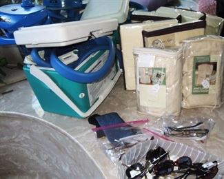 Sheets, medical supplies. Prescription and reader glasses