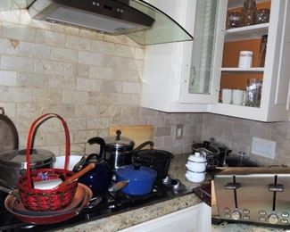 Kitchen basics. Stainless toaster, pots and and pans including LeCruiset