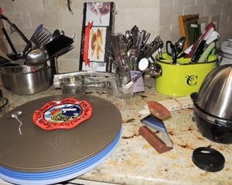 Chargers, place mats and linens. Quality flatware set, utensils, small appliances