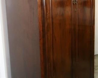 Armoire with built in storage cubbies