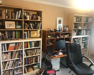 Good quality wooden bookcases.  Handmade computed desktop and hutch.  File cabinets.  All books are for sale.  Computer chair.