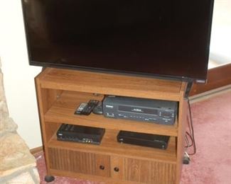 Small entertainment center/TV stand	28.5" W x 15" D x 25" H,   Vizio TV - Flat Panel	41"  Diagonal

