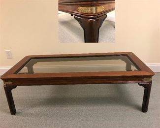 Beveled glass coffee table, brass corners