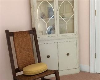 Cane back and seat oak rocker, white corner cabinet