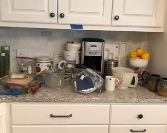 Assortment: Cuisinart coffee maker, Mr. Coffee, milk glass, pottery, mixing bowls, vintage plastic glasses, Tupperware salt/pepper...