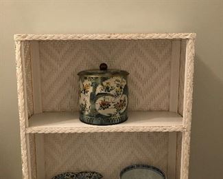 Nice white wicker shelf with smalls...