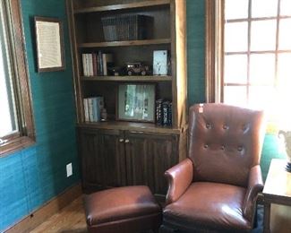 Brown leather straight back chair with matching ottoman