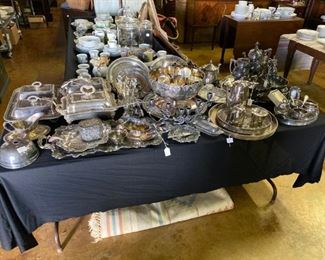 ONE OF TWO TABLES OF SILVER HOLLOWARE