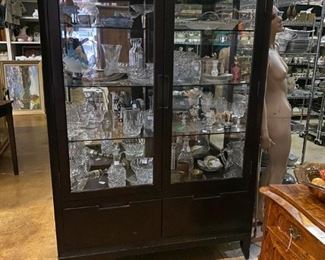 SHOWCASE FULL OF CUT GLASS AND OTHER CRYSTAL