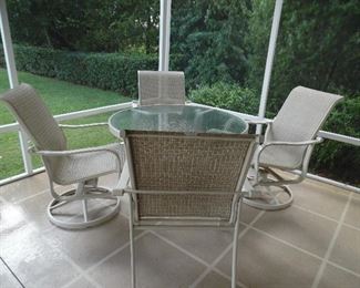 Outdoor patio set.  2 swivel chairs, 2 side chairs