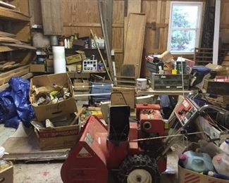 The garage: lumber, RotoTiller, Supplies
