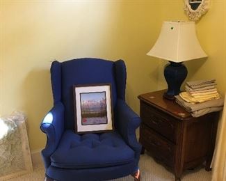 blue upholstered arm chair