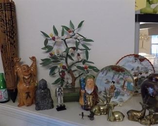 Asian inspired pieces...Buddah, Jade tree, porcelain plates, brass, and more