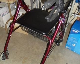 Burgundy walker w/seat/basket & hand brakes  perfect condition 