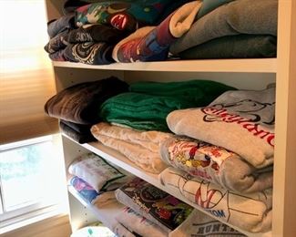 Hundreds of graphic tee shirts 