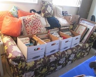 Sofa full off Assorted Throw Pillows and Boxes of Picture Frames...Don't Pay Retail, we have an Incredible Selection!!!