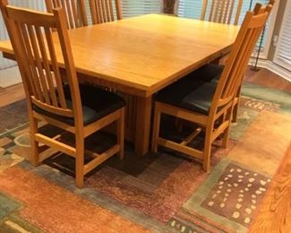 . . . a beautiful mid-century/Danish-modern looking table with area rug
