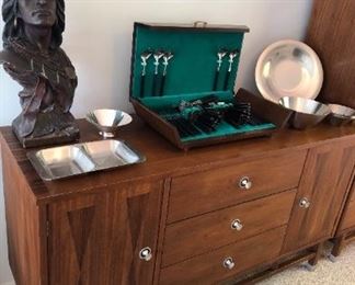 Walnut & Rosewood Credenza                                            Antique? Ceramic Native American? Bust,                  70-Pice Danish Modern Stainless/Bakelite Flatware,                                             MCM Futuristic Stainless and Bakelite