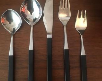 12-Teaspoons, 12-Tablespoons, 17-Table Knives, 13-Dinner Forks, 12-Salad Forks, 5-Sugar Spoons? 1-Butter Knife