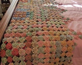 Antique Yo-Yo quilt from feed sack fabric