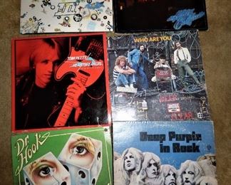 Literally 100's of Vinyl LP's from 1960's-1970's-1980's.  These next pictures are only samples of what is here !Led Zeppelin III, Eagles Hotel California, Tom Petty, The Who, Dr. Hook, Deep Purple