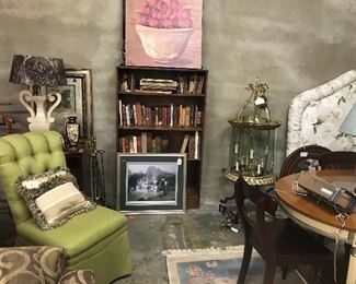 Chairs and books and art. Plus a huge brass lantern.