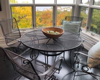 Wrought Iron table and four chairs