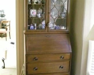Lovely antique secretary/desk with three drawers and glass doors