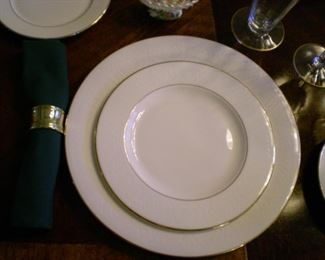 Lenox "Hannah Gold" china set . 9 five piece place settings.