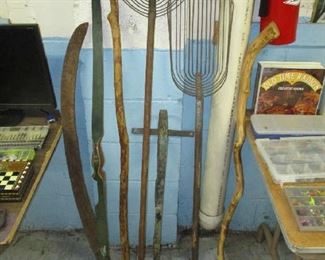 Antique yard tools and bow