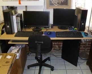 2 computers, monitors, keyboards