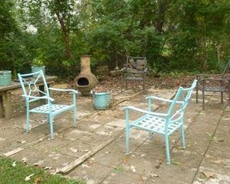 4 matching patio chairs (2 have been painted), pottery planters & chiminea