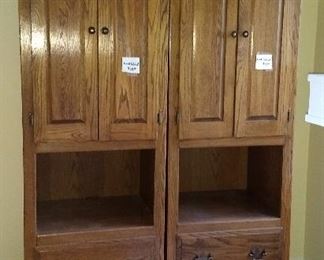 a pair of tall cabinets