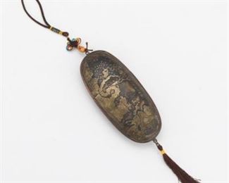 Chinese Patinated Copper Alloy Oval TwoPart Scenic Container with Silk Cords, Carved Bone Scull and Tassel