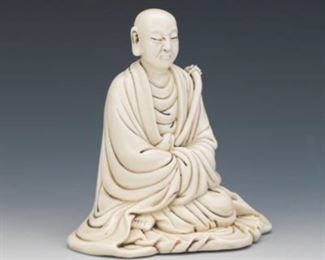 Chinese White Glazed Figure of an Aescetic