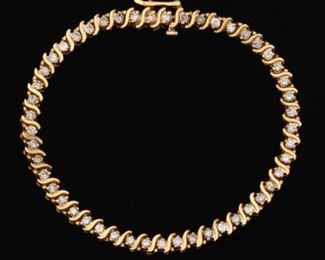 Ladies Gold and Diamond Scroll Design Tennis Bracelet