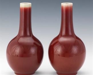 Pair of Sang de Boeuf Bottle Vases