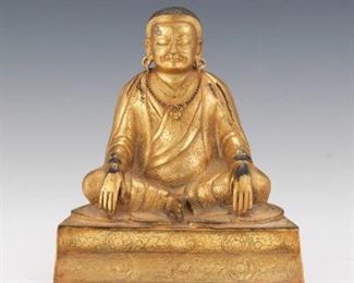 Tibetan Gilt Bronze Ming Style Figure of Sitting Arhat, ca. Qing Dynasty 