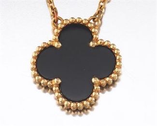 Van Cleef  Arpels Gold and Onyx Alhambra Necklace 