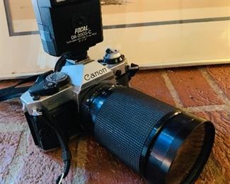 Canon 35mm, AE-1 with lens, flash, strap and case.