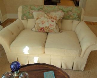 Two-place upholstered loveseat 