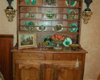 Good collection of majolica in early 19th Century cabinet
