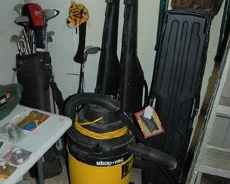 Shop vac and golf clubs