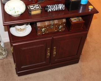 Solid wood storage cabinet - this one has vinyls!