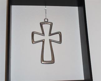 Cross in wall frame