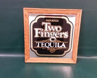 sign two fingers tequila