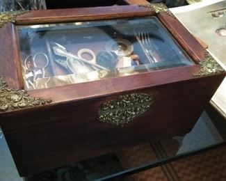 Antique wood box with bevelled glass and decorate hinges