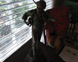 Pair of bronze male and female statues