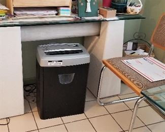 Modern console/side table along with a shredder and vintage chair